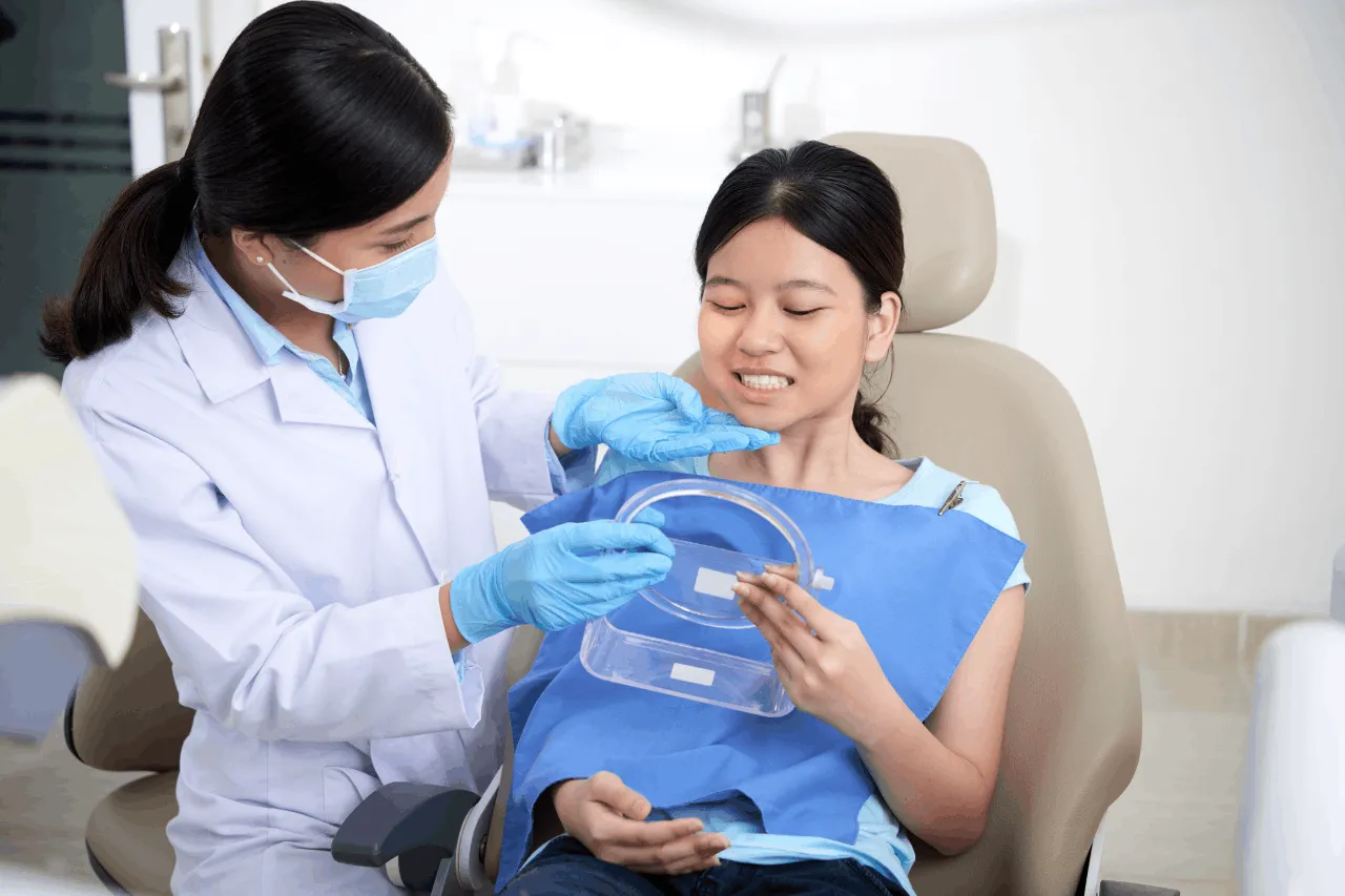 female patient at the dentist