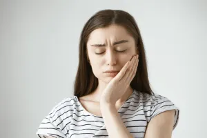 female with toothache