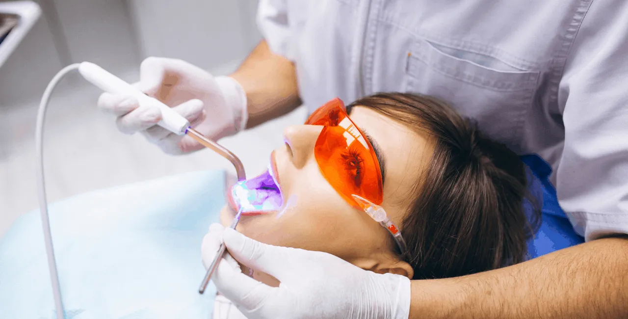 woman getting her teeth whiten