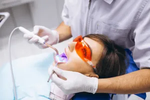 woman getting her teeth whiten