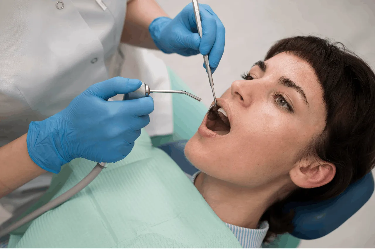 woman scaling her teeth