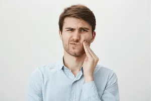 man with toothache
