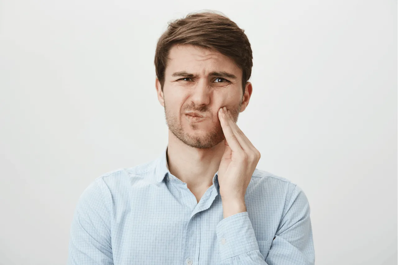 man with toothache